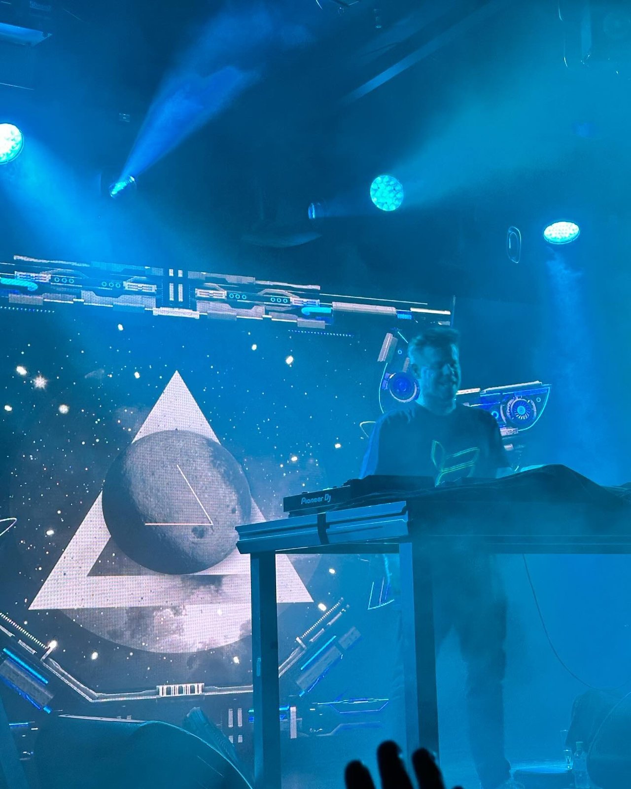 DJ Alphire behind the decks on Pioneer DJ gear at a Bay Area show