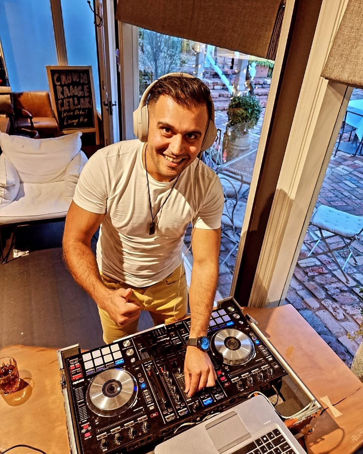 DJ Alphire behind the decks at a Noroz party