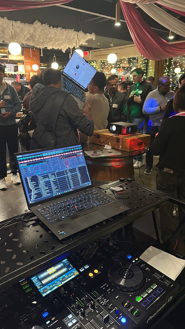 DJ Alphire performing inside a bounce house at a kids' event – Pioneer DJ and Serato setup