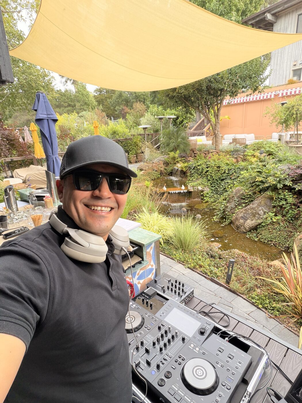 DJ Alphire's Pioneer DJ setup at night – outdoor evening event